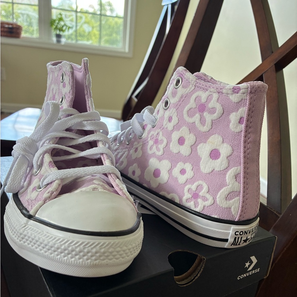 Never worn converse high tops with flowers